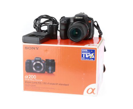 black, body G, powers up, takes a picture, comes with battery and charger, with a Minolta 18-70mm zoom lens, barrel F-G, opti