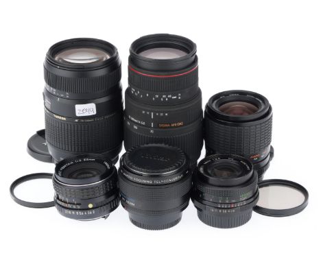 comprising a Pentax f/2 55mm, barrel G, optics G, a Sigma APO DG 70-300mm macro, barrel VG, optics VG, a Sigma 35-70, barrel 