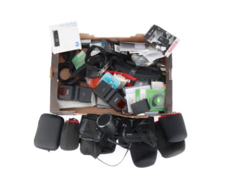 to include a Minox flash, other flashes, cokin filters, camera straps, lens cases, table top tripods and more items,