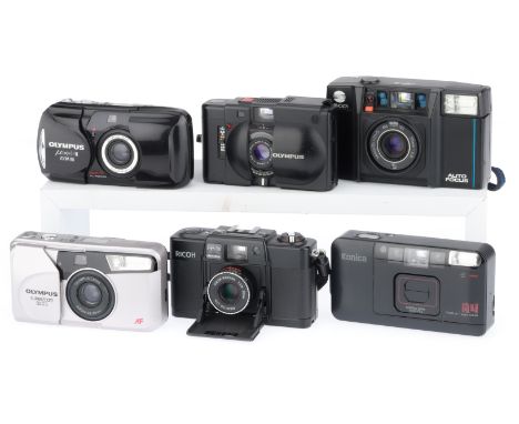 to include an Olympus Mju II Zoom 80, makes noises but won't turn on when battery is inserted, also with a Konica A4, camera 
