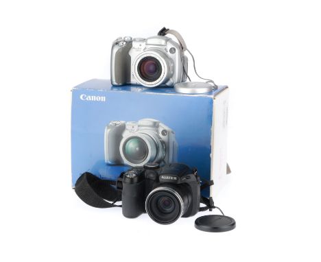 comprising a Fujifilm finepix S6100, black, body G, LCD G, powers up, takes a picture, flash works, and a Canon Powershot S2 