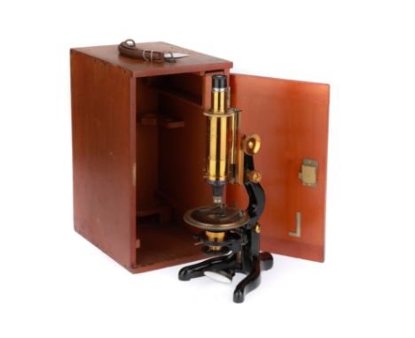 English, c.1920, engraved to the body tube "SERVICE" PETROLOGICAL W Watson &amp; Sons Ltd, London46581' the microscope on bla