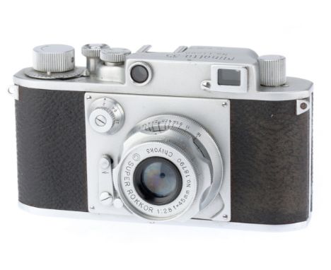 silver, serial number 11200, top plate engraved C.K.S. shutter curtains are stiffened, shutter not working, with a Super-Rokk