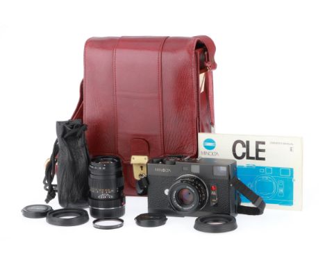black, body VG-E, shutter works, rangefinder bright and clear, with a M-Rokkor f/2 40mm lens, barrel VG, optics G, very light