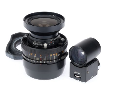 black, serial number 17685, shutter works, iris works, optics G, with rubber hood and matching viewfinder.