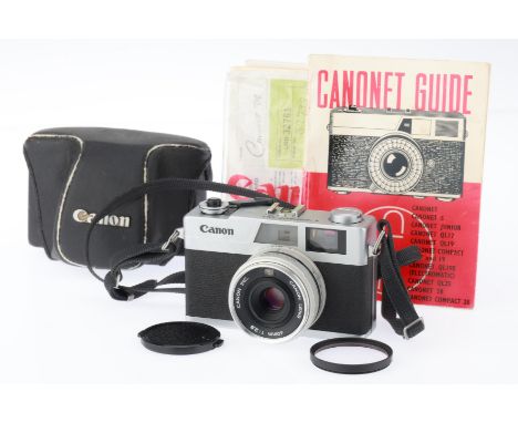 silver, body VG, shutter works, rangefinder patch works, with cap and case.