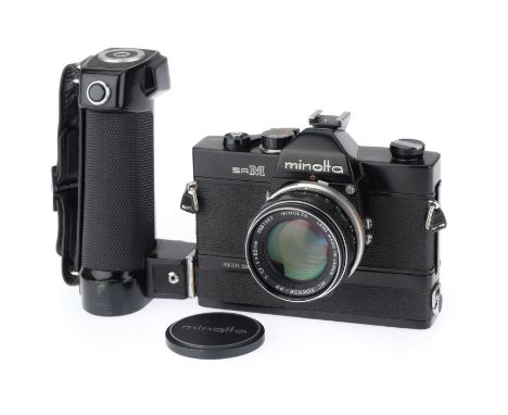 black, serial number 1001372, body G, shutter works using manual advance, the battery container has been cleaned but the elec