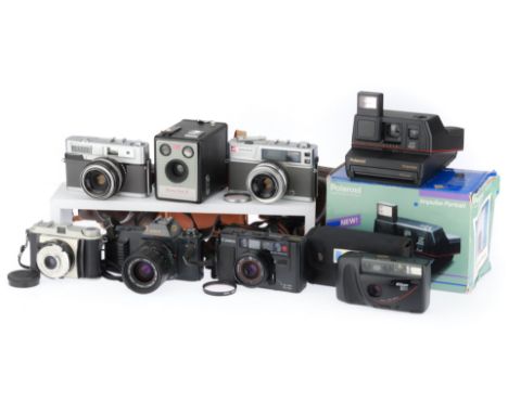 to include a Canon T50 SLR, working, with an FD 35-70mm zoom lens, optics G, Nikon RF2 compact, untested, battery door loose,