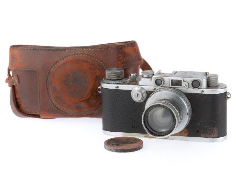 silver, serial number 135463, body F, some leatherette missing, marks and small dents to body, shutter fires but speeds not a
