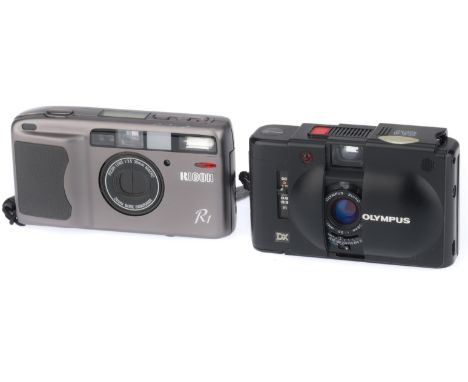to include a Ricoh R1, grey, body G, powers up, takes a picture, flash works, LCD not working, an Olympus XA-4, black, body F