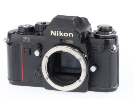 black, serial number 1472521, body G, some brassing to top and bottom plates, shutter works with batteries inserted, 