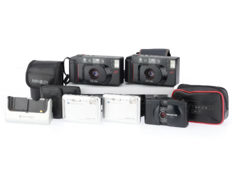 to include a Konica Minolta Dimage X1, silver, body G, with charging dock, a second Konica Minolta Dimage X1, silver, body P-