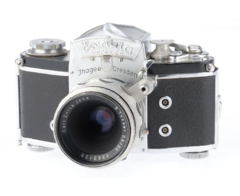 chrome, serial number 892789, body F-G, some paint wear, dent to prism housing, shutter working but sticks at slow speeds, wi