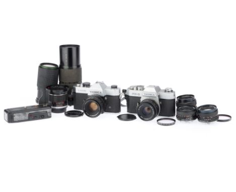 comprising a Yashica TL-Electro, body G, shutter jammed, untested, a Yashica FX-2, body G, shutter jammed, untested, and lens