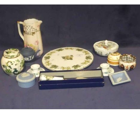 A mixed lot of thirteen items of ceramics to include Royal Worcester cake stand &amp; knife, Wedgwood Jasperware, candle stic