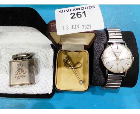 A Seiko manual wind gentleman's stainless steel wristwatch, a 1936 Berlin olympics souvenir cigarette lighter and metal tiepi