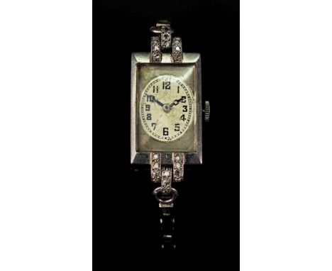 Rolex; a lady's Prima platinum cased cocktail wristwatch, the silvered dial with Arabic numerals to a manual wind movement, i