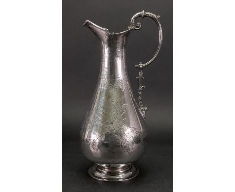 A Victorian silver wine ewer, Edward Hutton, London 1883, of pear shape, chased with flowering and fruiting branches, having 