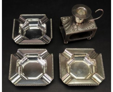 A set of three square silver ashtrays, James Dixon & Sons, Sheffield 1952, with canted corners and decorated borders and a la