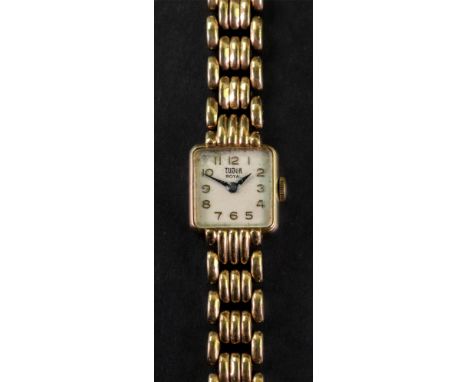 Tudor Royal; a lady's 9ct gold cased wristwatch, the white enamelled dial of square design, signed Tudor Royal, with gilt Ara