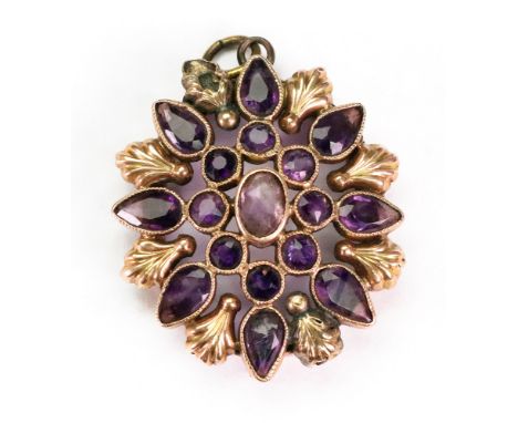 A Victorian amethyst-set pendant, with seventeen amethysts in a floral design, 4.8g gross.