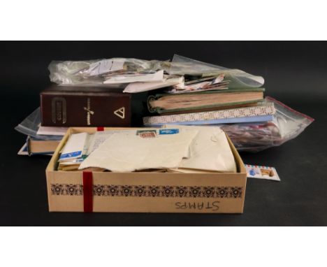 The Strand stamp album containing an all-world used collection, a Swift Sure loose leaf album and a Healey's postage stamp al