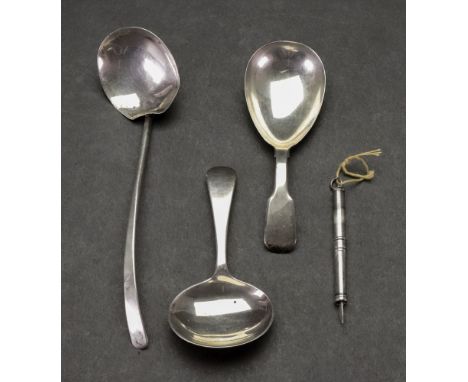 A William IV silver fiddle pattern caddy spoon, William Eaton, London 1833, an Edwardian Old English pattern silver caddy spo