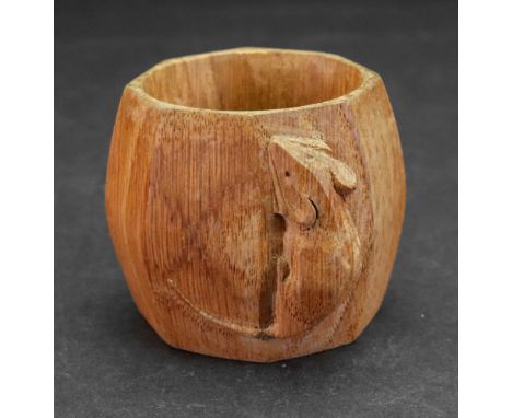 A Robert Thompson 'The Mouseman' octagonal oak napkin ring, carved with a mouse, 5cm wide.