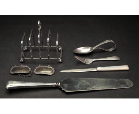 A five-bar silver toast rack, George Unite, Birmingham 1926, on ball feet, 9.5cm wide, a pair of George III style silver bott