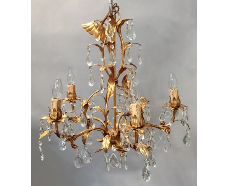 A pair of Christopher Wray five light gilt metal and facet cut glass chandeliers, of leafy scroll form, the curved branches i