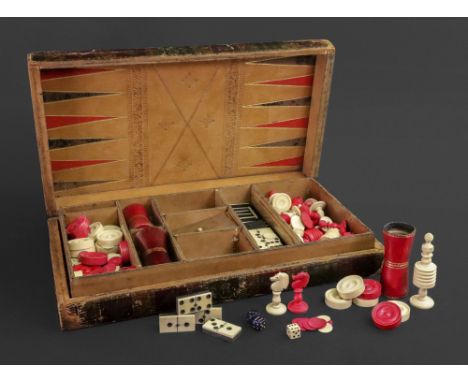 A Victorian games compendium, the gilt tooled rectangular leather and morocco covered games board for chess, draughts and bac