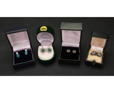 A collection of four pairs of diamond and gemset earrings, comprising:  a pair of diamond and opal earrings, set in 18ct whit