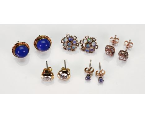 A small collection of diamond and gem-set earrings, comprising: a pair of opal-set earstuds of flowerhead design (deficient o