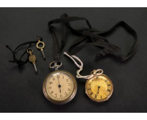 An 18ct gold key wind pocket watch, the engine turned dial with Roman numerals, the foliate engraved case detailed 18k, 36g g