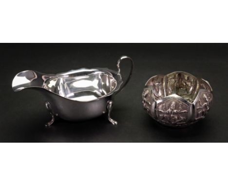 A George II style silver helmet shape sauce boat, Emile Viner, Sheffield 1933 and an Indian circular bowl, late 19th/early 20
