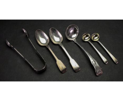A pair of Victorian silver fiddle and shell pattern sugar tongs, Thomas Sewell, Newcastle 1859, monogrammed, a pair of George