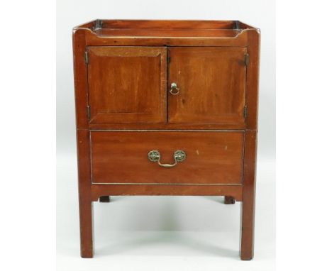 A George III mahogany tray top night commode, with cut-out carrying handles and lozenges, enclosed by a pair of doors, the pu