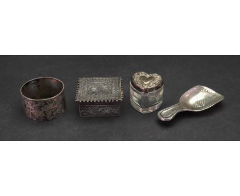 A silver caddy spoon, Alfred Marston, Chester 1915, the shovel bowl with Greek key band and centred by a lozenge, the handle 