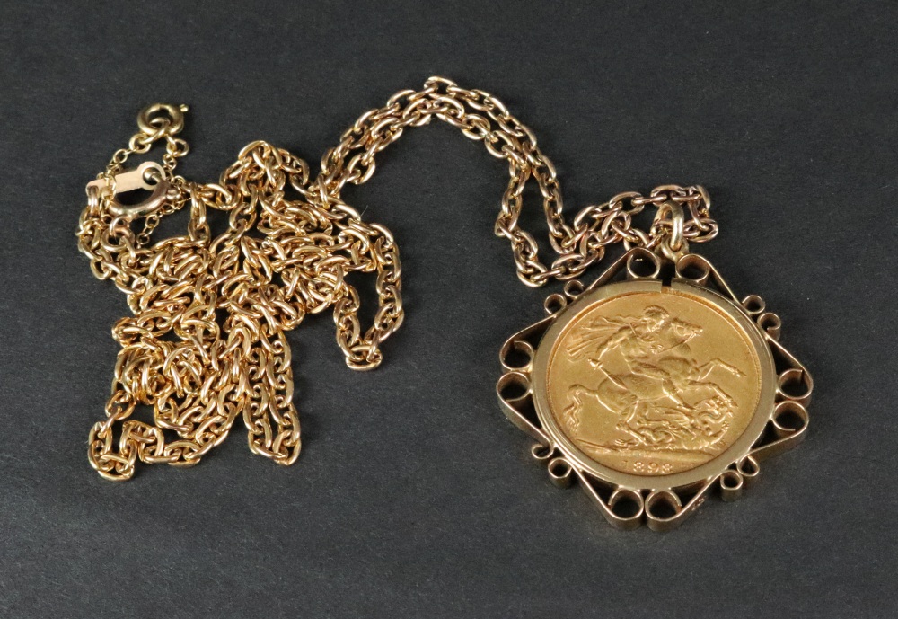 A Queen Victoria gold sovereign dated 1898, mounted as a pendant, set ...