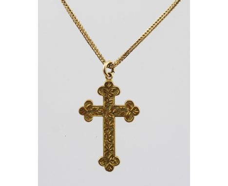 AN ORNATE 15CT GOLD CROSS mounted on a 9ct gold chain with bolt ring clasp 