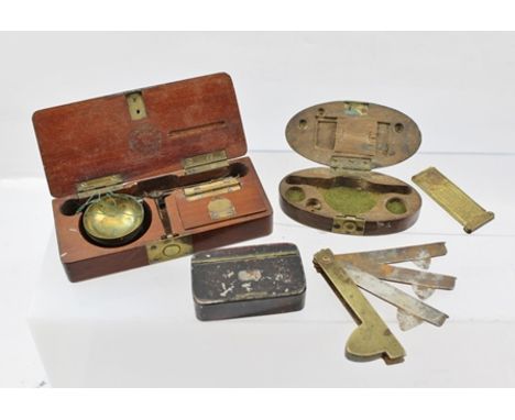 A LATE 19TH CENTURY FRENCH MAHOGANY CASED SET OF MINIATURE STEEL BALANCE SCALES, with brass pans and weights, interior of lid