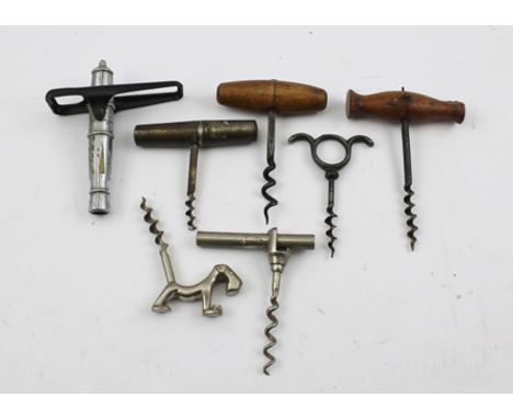 A COLLECTION OF SEVEN VARIOUS CORKSCREWS, includes novelty ones, one in the form of a stylised dog, one in the form of a cann