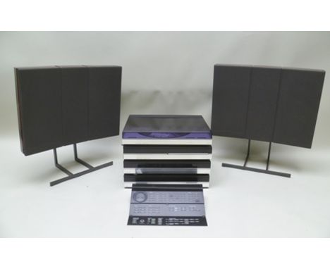 A BANG & OLUFSEN 6500 MODULAR STACKING STEREO SYSTEM with master control panel and a pair of "Redline" speakers on stands, wi