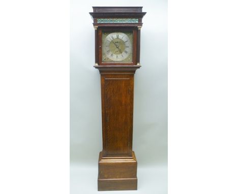 AN EARLY 19TH CENTURY OAK LONGCASE, having 30-hour movement, brass face with silvered chapter ring, bearing the name "Lakin -