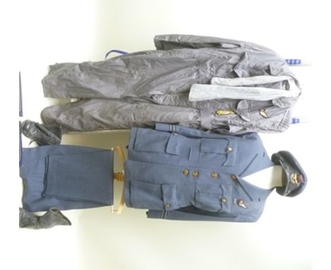 AN RAF UNIFORM, the tunic jacket with navigators patch, complete with cap, flying suit and boots 