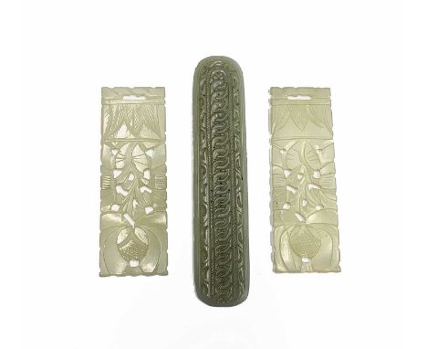 A pair of Chinese carved jade rectangular plaques, Qing Dynasty, 9.5 x 3.2cm and another jade plaque, 12.3 x 2.5cm. Condition