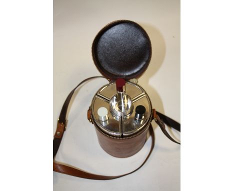 A TRAVELLING TRI BOTTLE HIP FLASK SET IN FITTED CASE