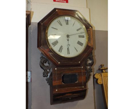 A LATE 19TH CENTURY ROSEWOOD WALLCLOCK, the enamel dial with painted numerals, typical carved fret wings, H 69 cm A/F