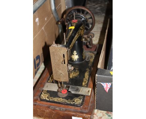 A VINTAGE SINGER SEWING MACHINE