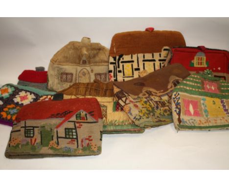 A COLLECTION OF VINTAGE COTTAGE THEMED TEA COSIES, comprising mostly embroidered examples together with knitted, felt and raf